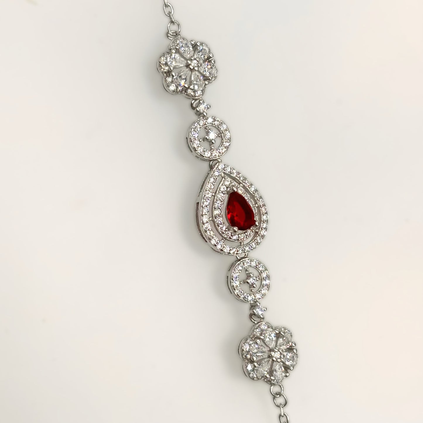 Elegant Ruby Teardrop & Floral CZ Bracelet in Italian 92.5 Silver