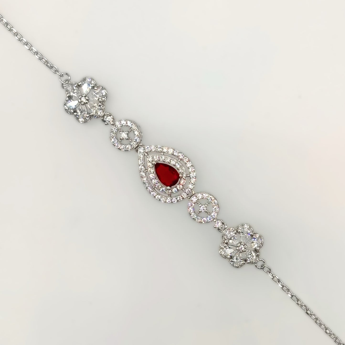 Elegant Ruby Teardrop & Floral CZ Bracelet in Italian 92.5 Silver