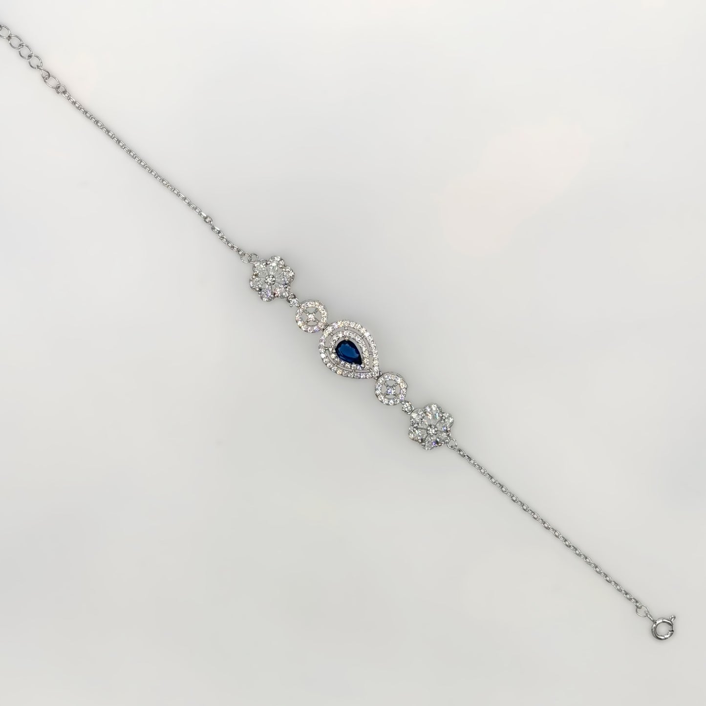 Royal Sapphire Droplet Halo Bracelet in Italian 92.5 Silver