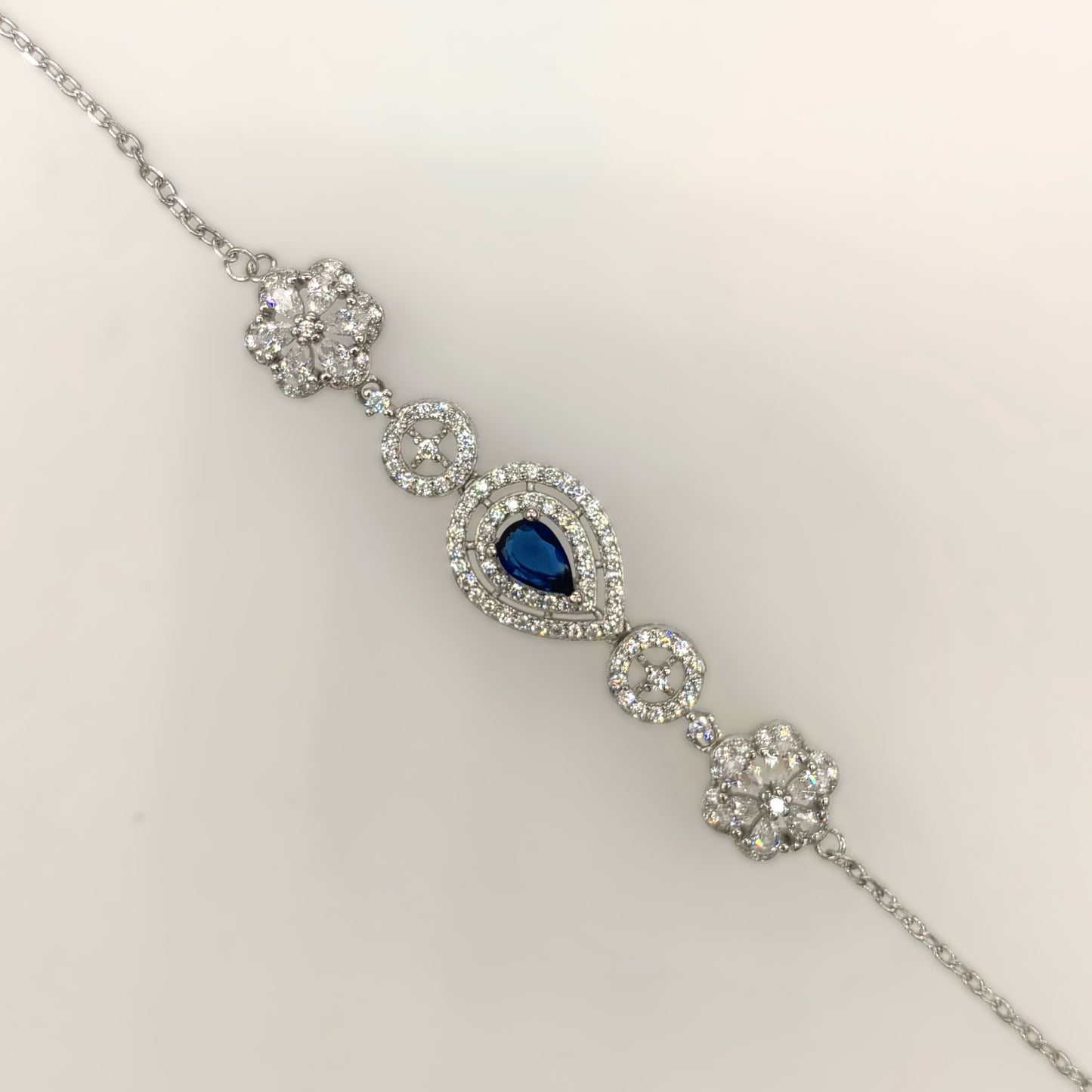 Royal Sapphire Droplet Halo Bracelet in Italian 92.5 Silver